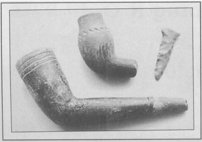 First Nations. Large clay pipe, c.1560 & flint drill found at McPhee site. Smaller clay pipe, c.1490 A.D. from the Elliot site.